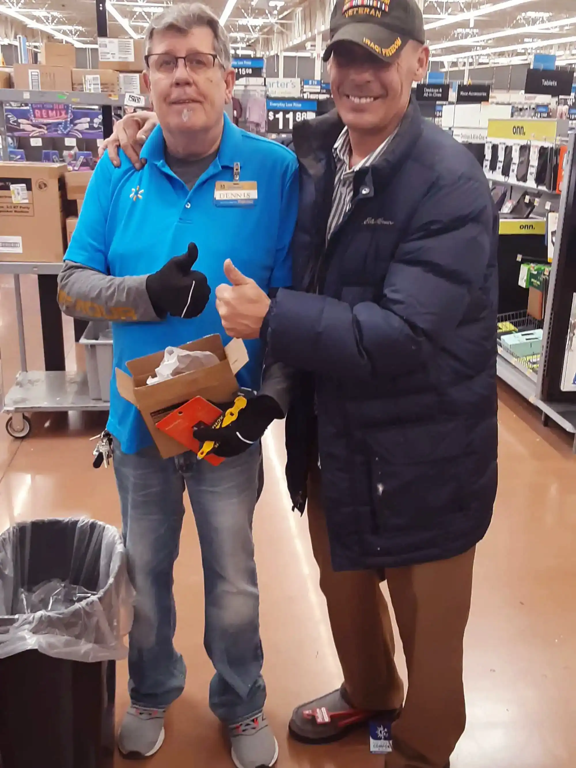 Author and Veteran David Haave in the moment for bringing books to Walmart families. -- David Haave